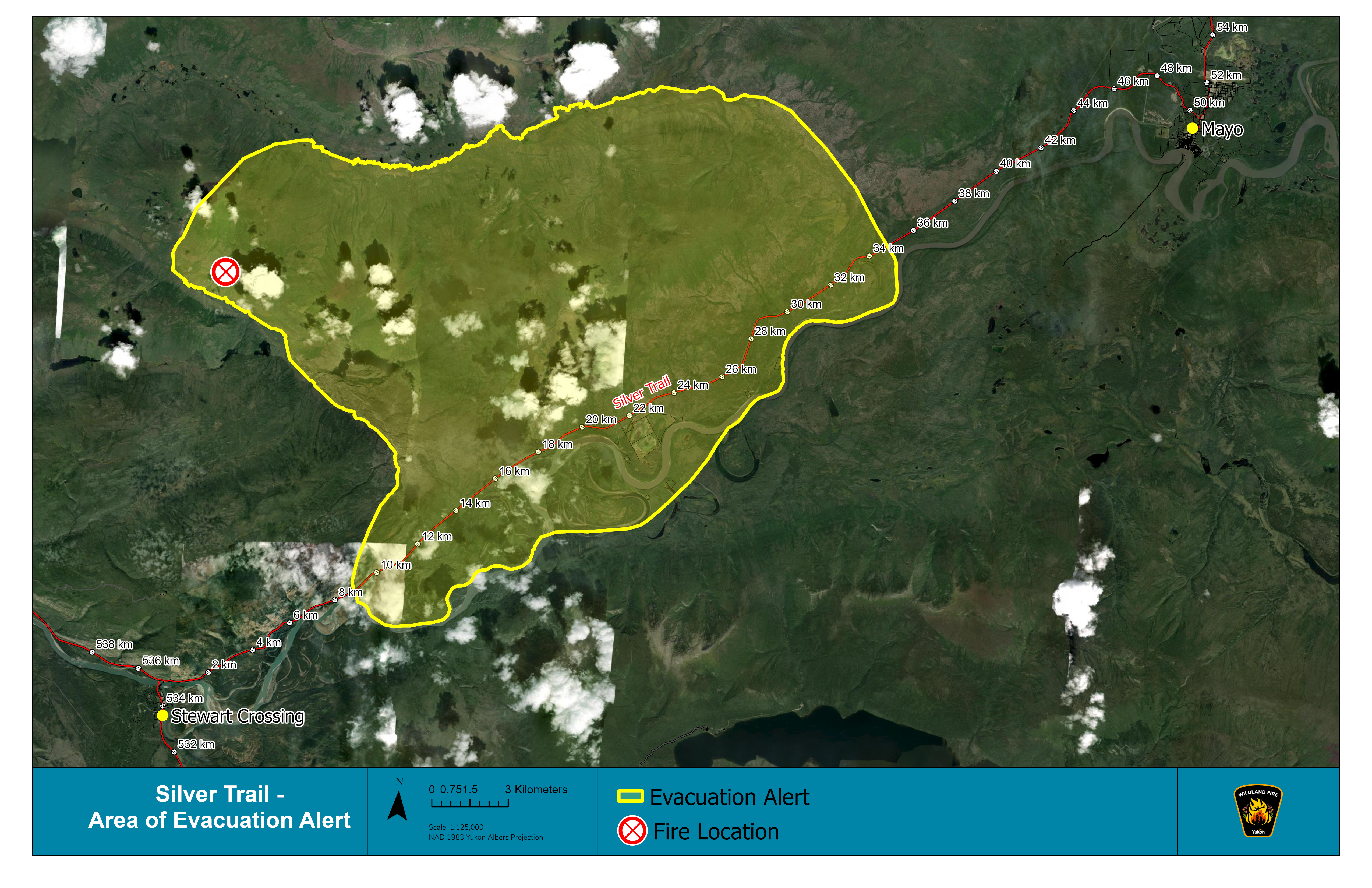 A map showing the Devil’s Elbow area of the Yukon, along the Silver Trail highway (highway 11) between Stewart Crossing and Mayo, Yukon. A yellow perimeter on the map shows the area under evacuation alert. The alert area extends from Kilometre 10 to Kilom