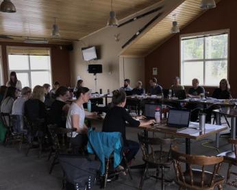 Staff gathered to work on writing website content to meet user needs