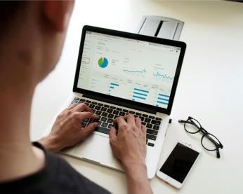 View of a laptop with charts displayed