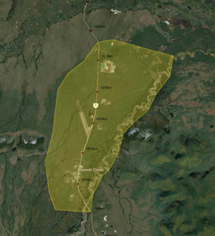 An image showing an evacuation alert area around the community of Beaver Creek. The area is coloured yellow and extends from the Beaver Creek Bridge to just north of the Beaver Creek Solid Waste Facility, including all properties along the Beaver Creek waterway east of the Alaska Highway.