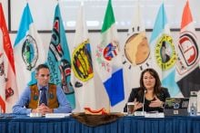 Grand Chief of the Council of Yukon First Nations, Math’ieya Alatini addresses the attendees while The Honourable Currie Dixon, Premier of Yukon listens, at the first sitting of the Yukon Forum in 2026 at the Kwanlin Dün First Nation Nàkwät'à Kų̀ Potlatch House. Photo credit: Government of Yukon.