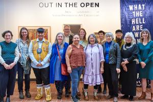 Minister Streicker and Garnet Muething, Art Curator with many of the artists whose works were added to the Yukon Permanent Art Collection at the Out in the Open exhibition event. Photo credit: Government of Yukon/Erik Pinkerton Photography.