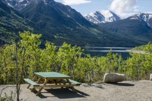 Picnic table with mountains in background