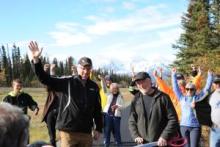 Minister of Highways and Public Works and Environment Nils Clarke and Mayor of the Village of Haines Junction Bruce Tomlin cut the ribbon in celebration of the newly paved Trans Canada Trail.